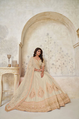 Beige Silk Wedding Lehenga with Leaf Embroidery & Peacock Motifs