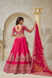 Rani Pink Silk Wedding Lehenga with Leaf Embroidery & Peacock Motifs