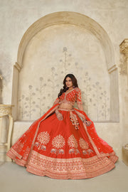 Orange Banarasi Silk Wedding Lehenga with Leaf Embroidery & Peacock Motif