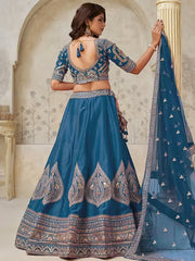 Teal Blue Silk Wedding Lehenga with Leaf & Peacock Motifs