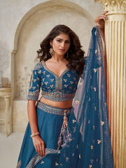 Teal Blue Silk Wedding Lehenga with Leaf & Peacock Motifs