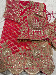 Rani Pink Bandhani Designer Saree with Heavy Zari Embroidered Blouse
