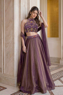 Deep Plum Intricate handwork blouse paired with a free-flowing, easy-to-carry lehenga