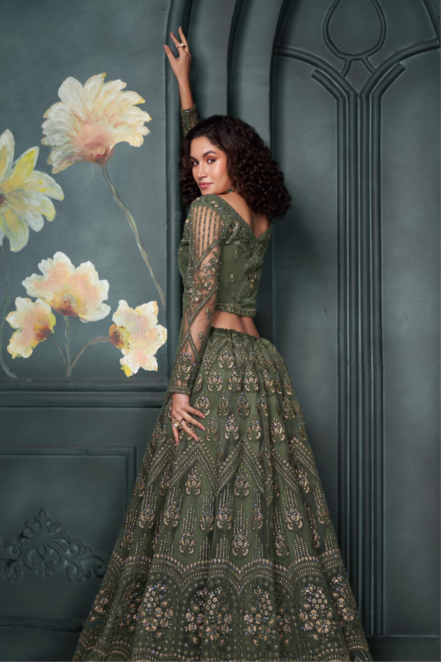 Green Colour Net Lehenga Featuring Exquisite Stone Embroidery