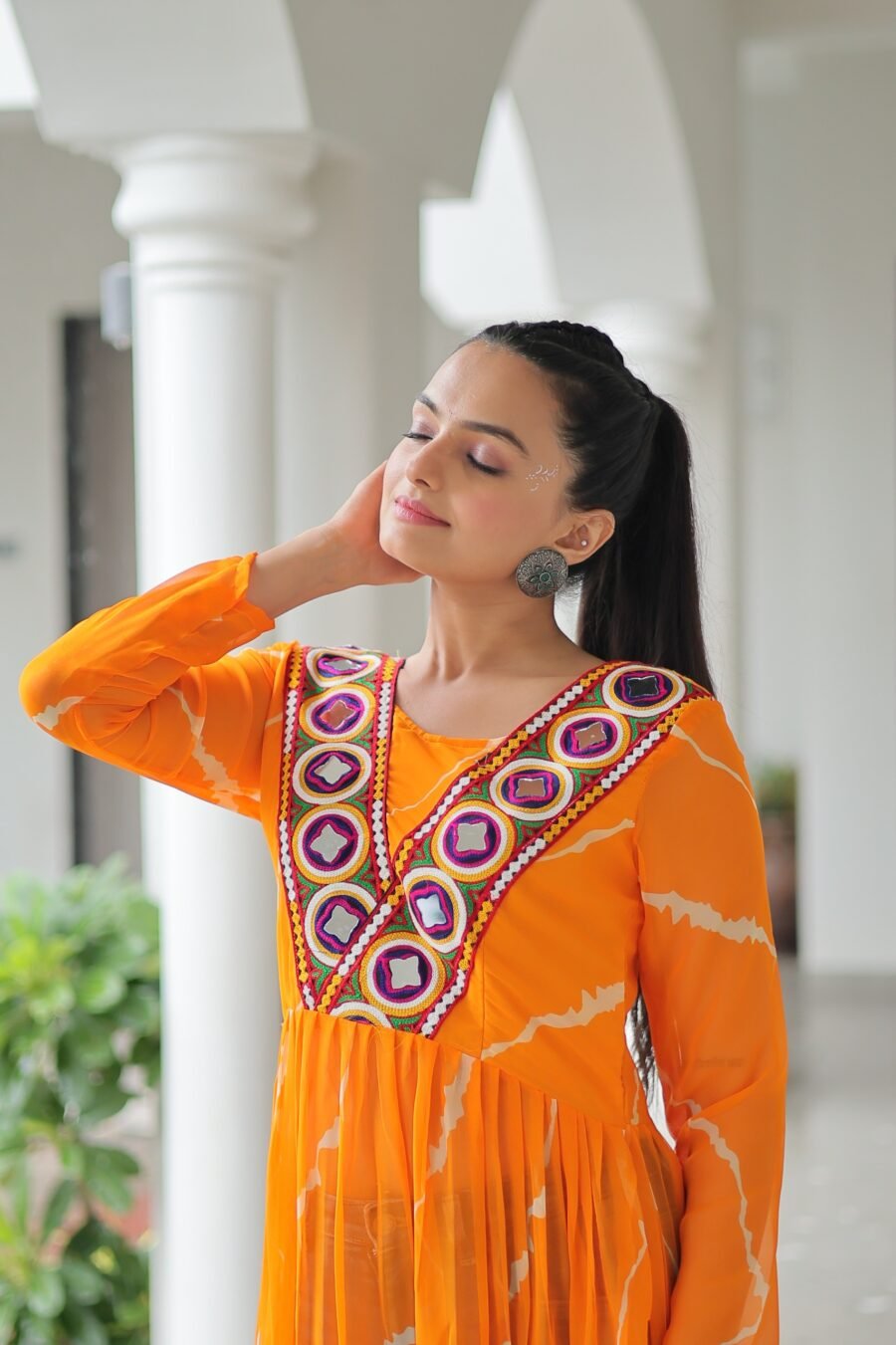 Yellow Print Work Kurti with kutchi Patchework in Faux Georgette.
