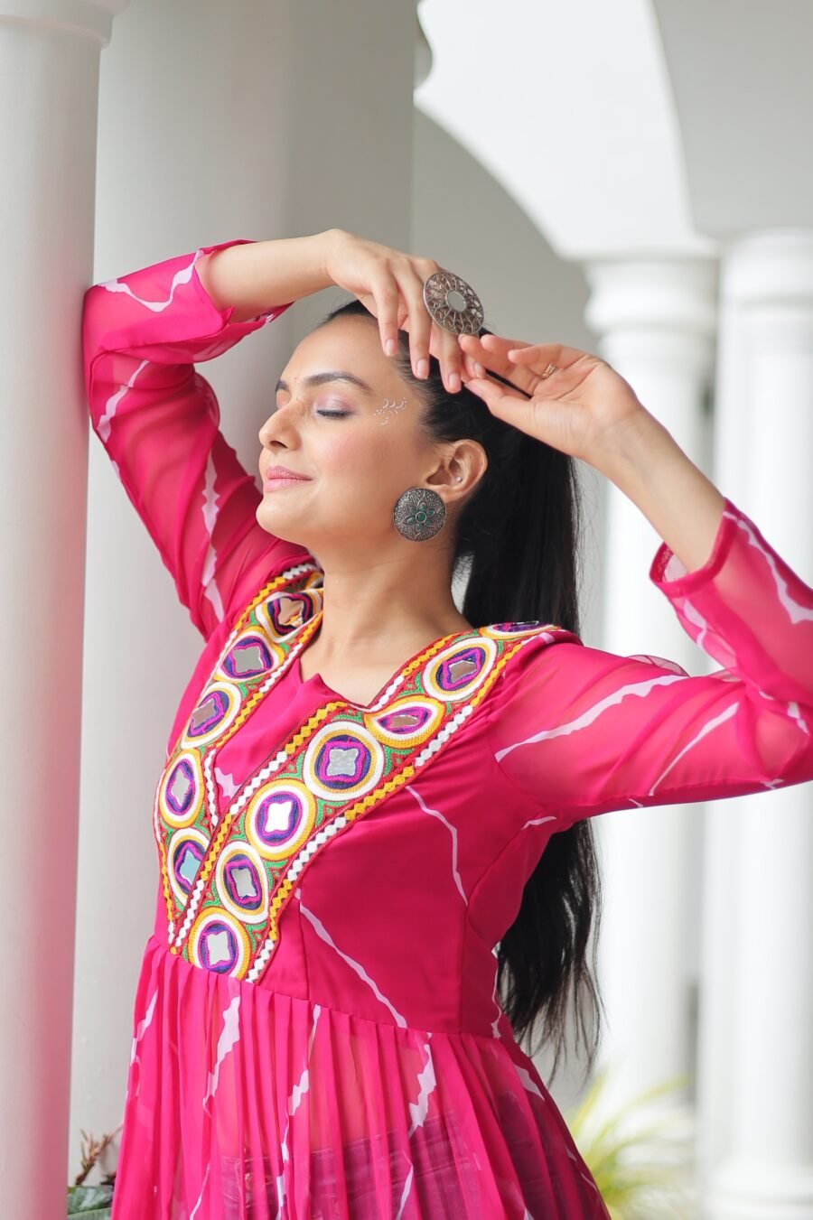 Pink Print Work Kurti with kutchi Patchework in Faux Georgette.