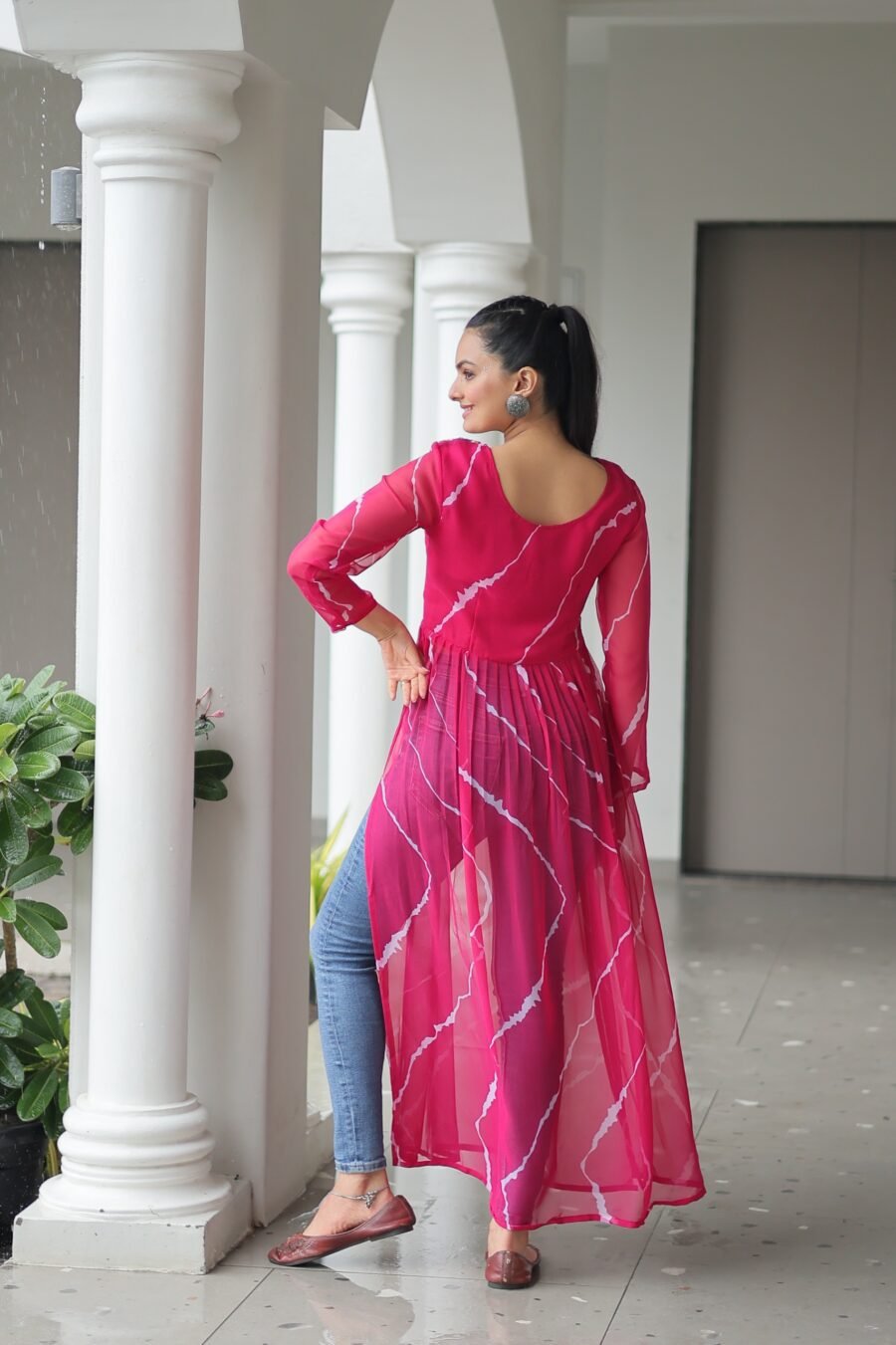 Pink Print Work Kurti with kutchi Patchework in Faux Georgette.